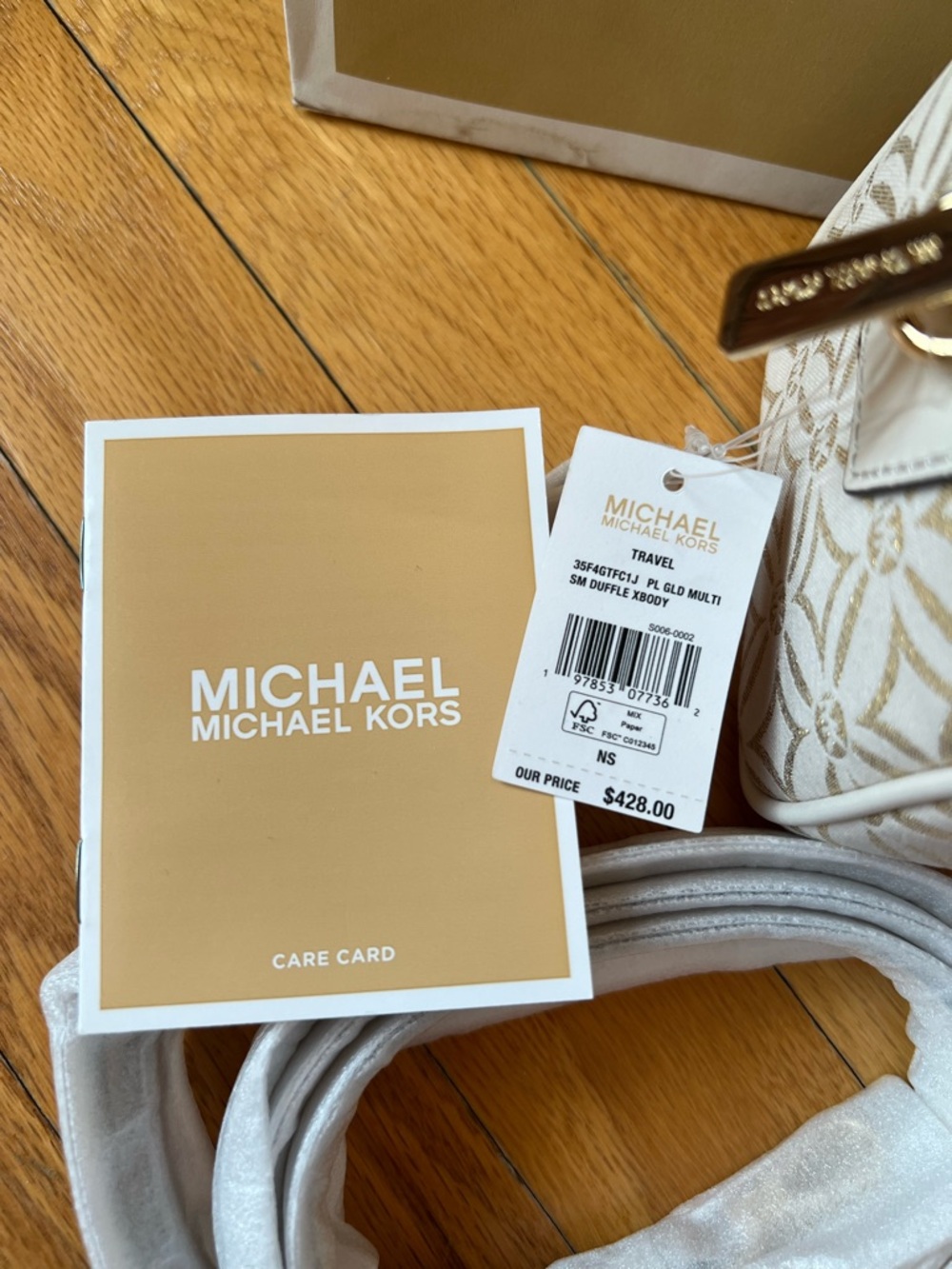 Michael Kors Ivory & Gold Travel Small Duffle Crossbody - Picture 5 of 14